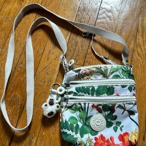 Kipling crossbody bag, floral. Never used. Like new